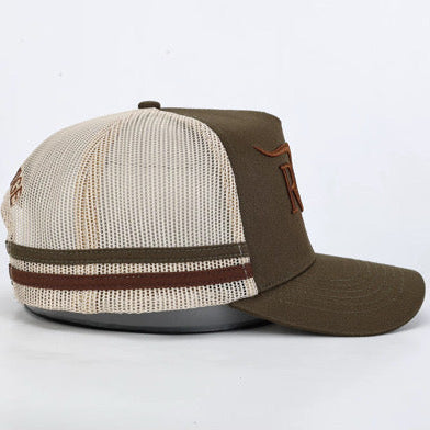 A trucker-style baseball cap with an olive brown front panel and brim, a cream mesh back, and two horizontal stripes in olive brown and dark brown near the edge of the crown.