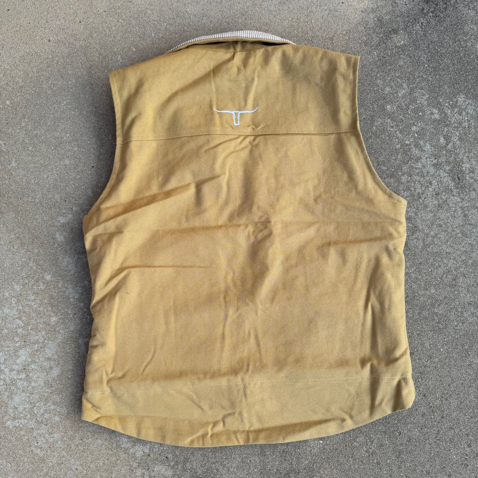 Beige fabric on a gray concrete surface