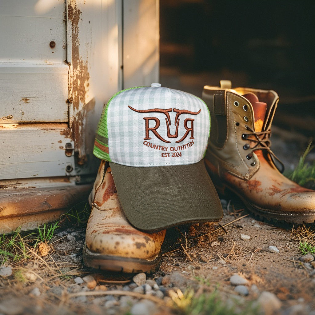 Cap and boots with 'Rustic Ridge Country Outfitters' branding on a rustic background